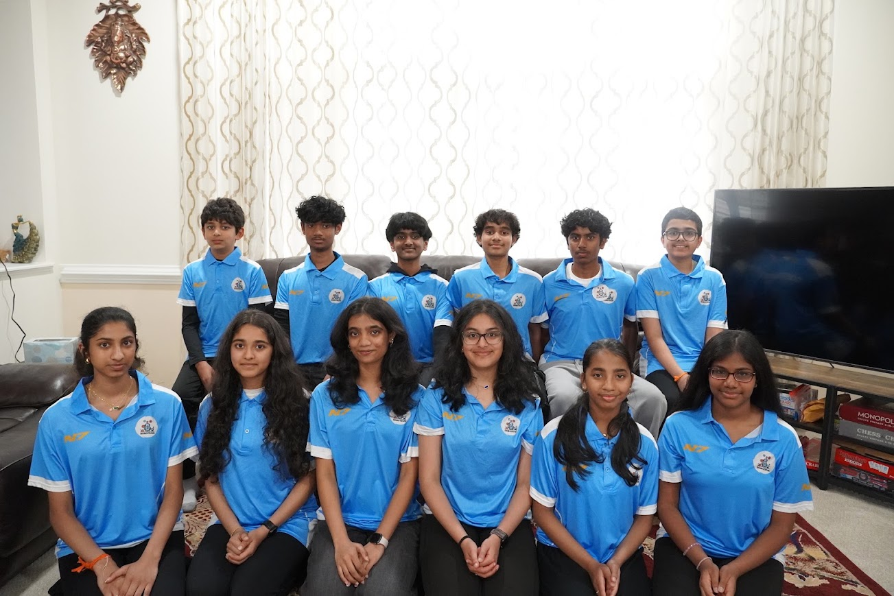 The twelve Robotechs team members wearing their blue team uniforms